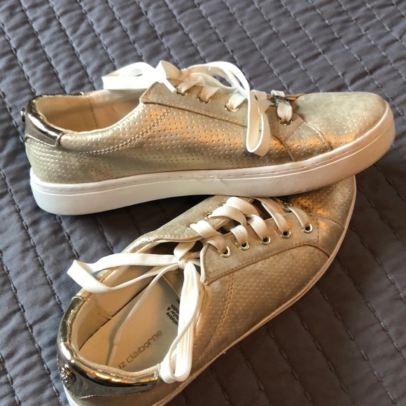 gold tennis shoes